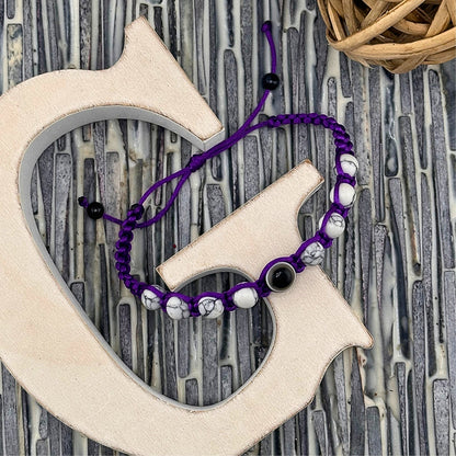 Evil Eyes and Howlite stones adjustable bracelet.